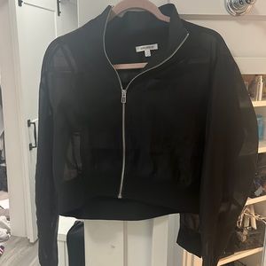 Good American black sheer crop zip up